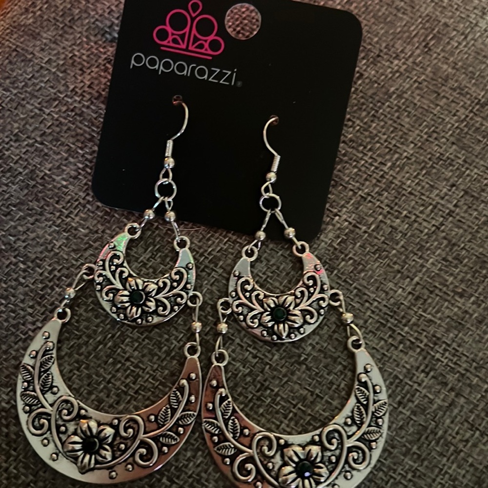 Silver earrings with green stone accents